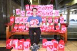 Volunteer with valentines he made for clients, 2017