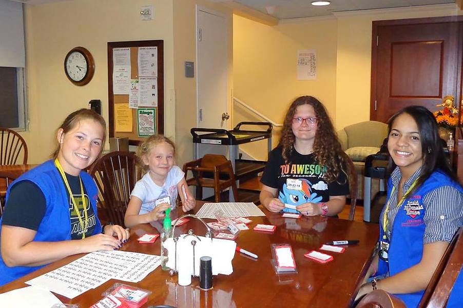 Assembling name badges, 2014