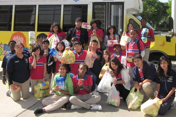 Harmoney School of Excellence - Endeavor donated canned goods, paper towels, & toilet paper, 2011